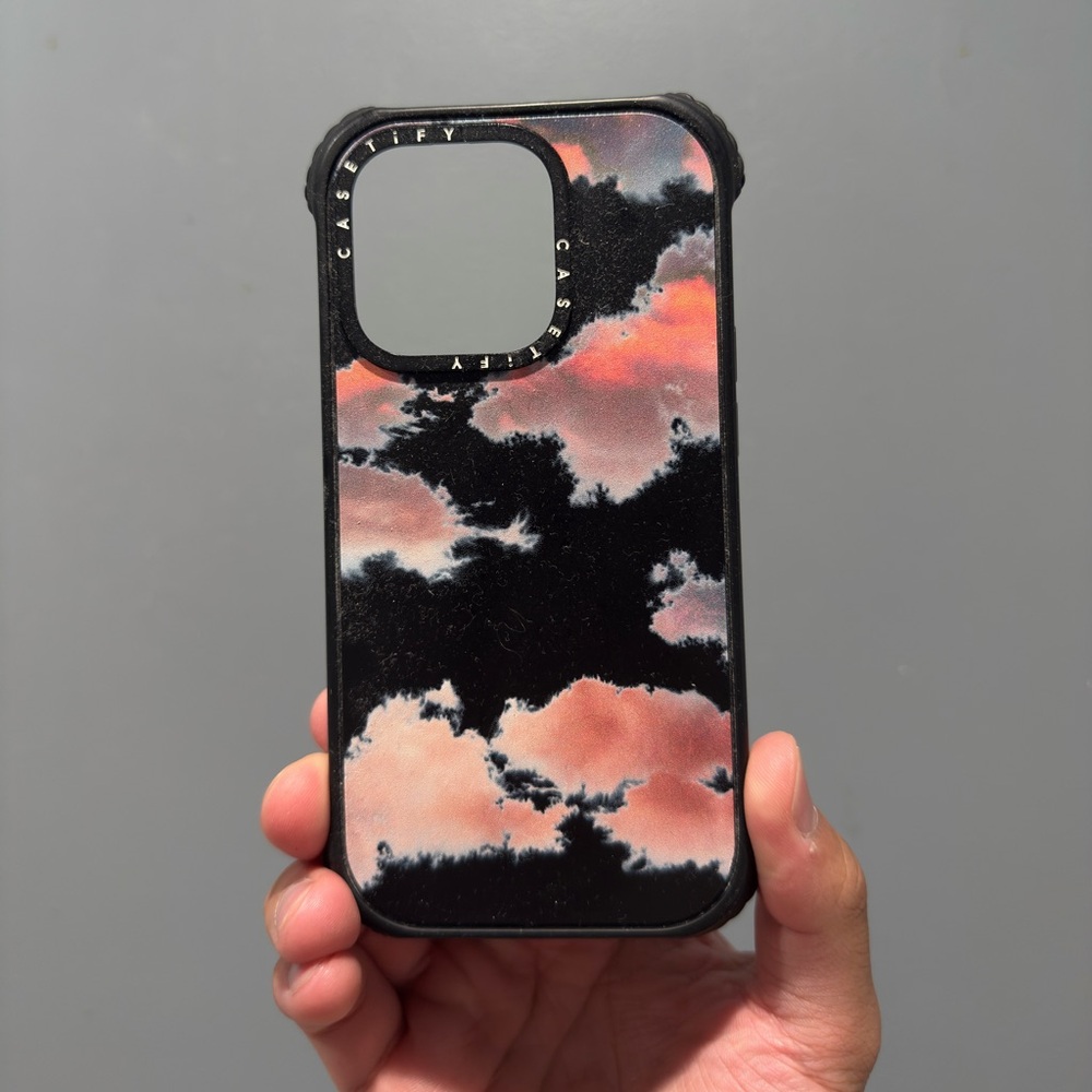 Casetify Black and Pink Cloud Design Phone (14 Pro) Case